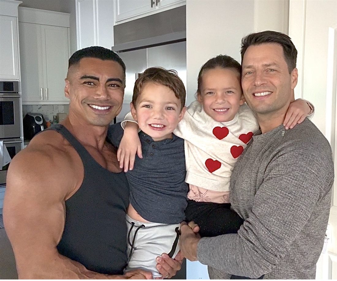 Dr. Suarez with his husband, Sebastien, and their children, Charlize and Julien